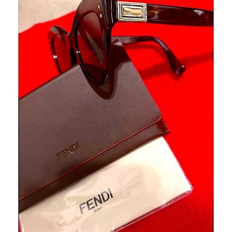 Woman’s Fendi Sunglasses And Case Number Fs413 001 120 